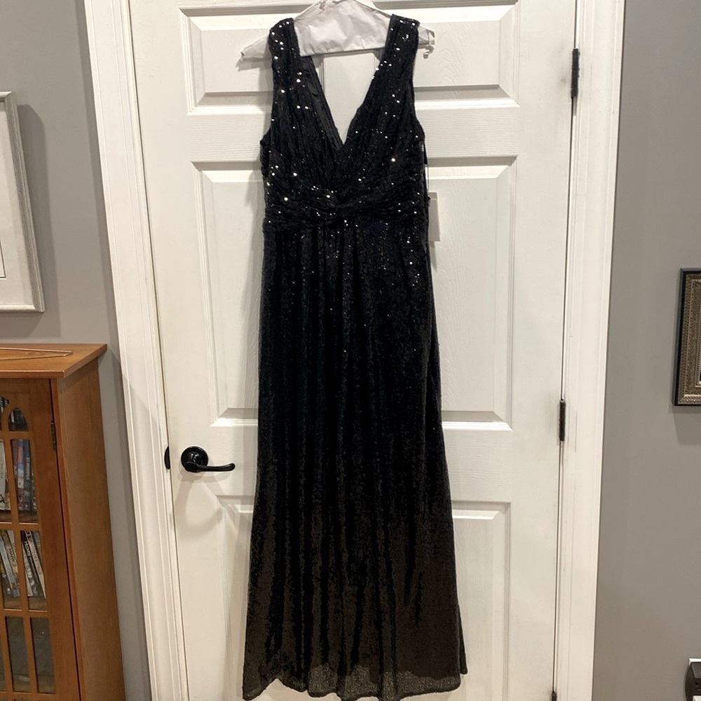 New w/ tags DresSale formal gown. Black Sequin, fully lined. Size 10.